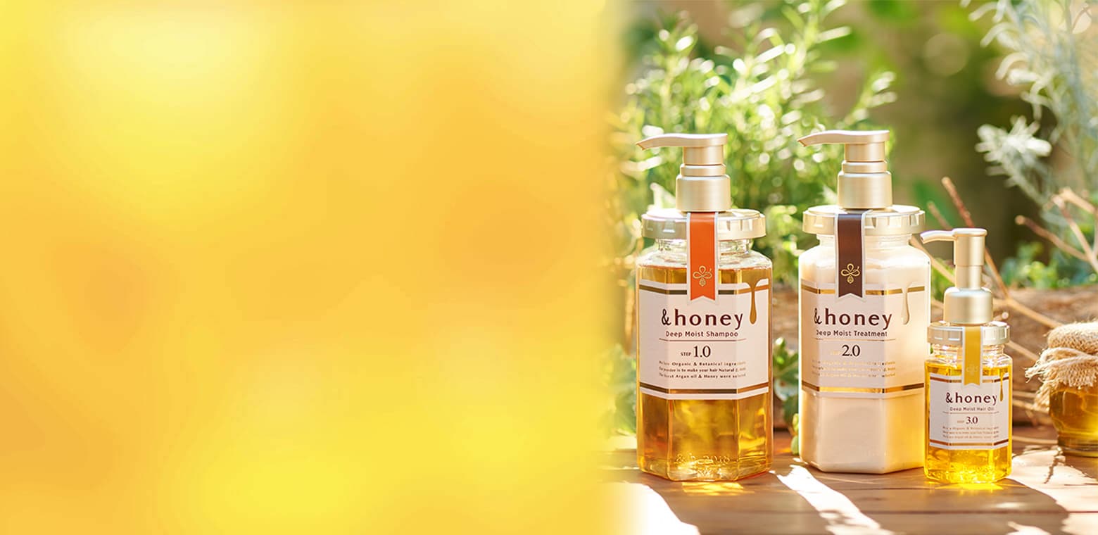 Fotografia oficial &honey: shampoo, tratamento e óleo Deep Moist à luz do sol